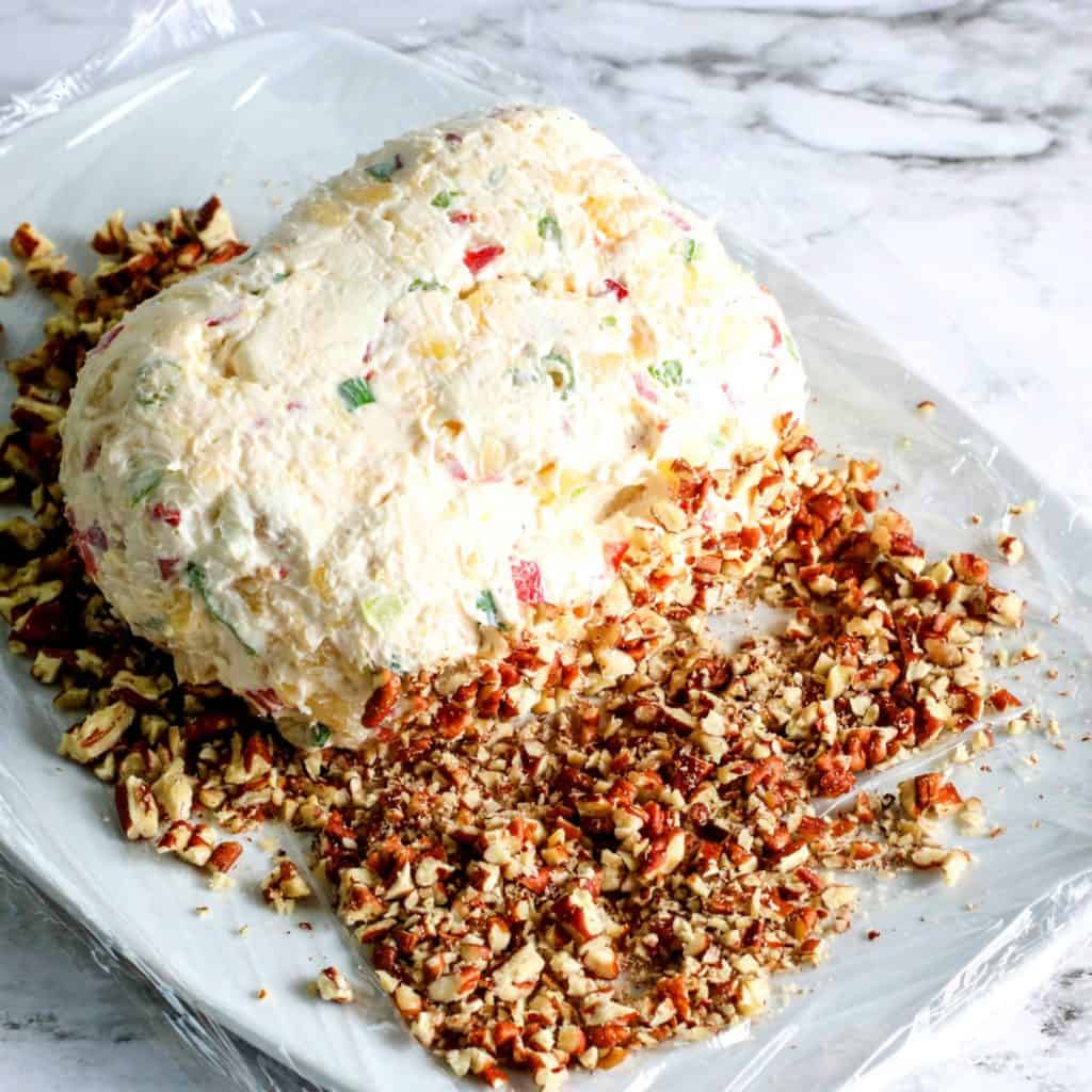Cover Pineapple Cheese Ball with Toasted Pecans