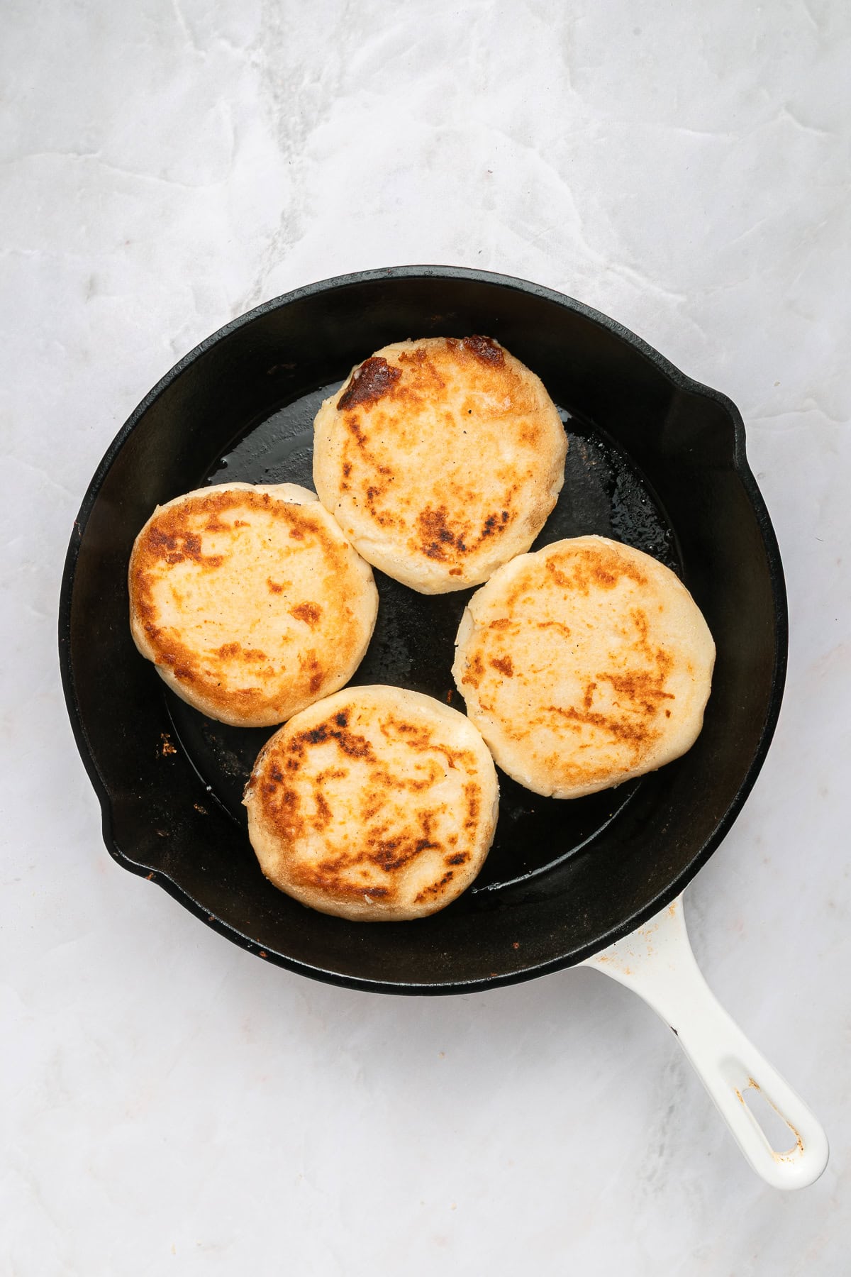 Arepas are golden brown.