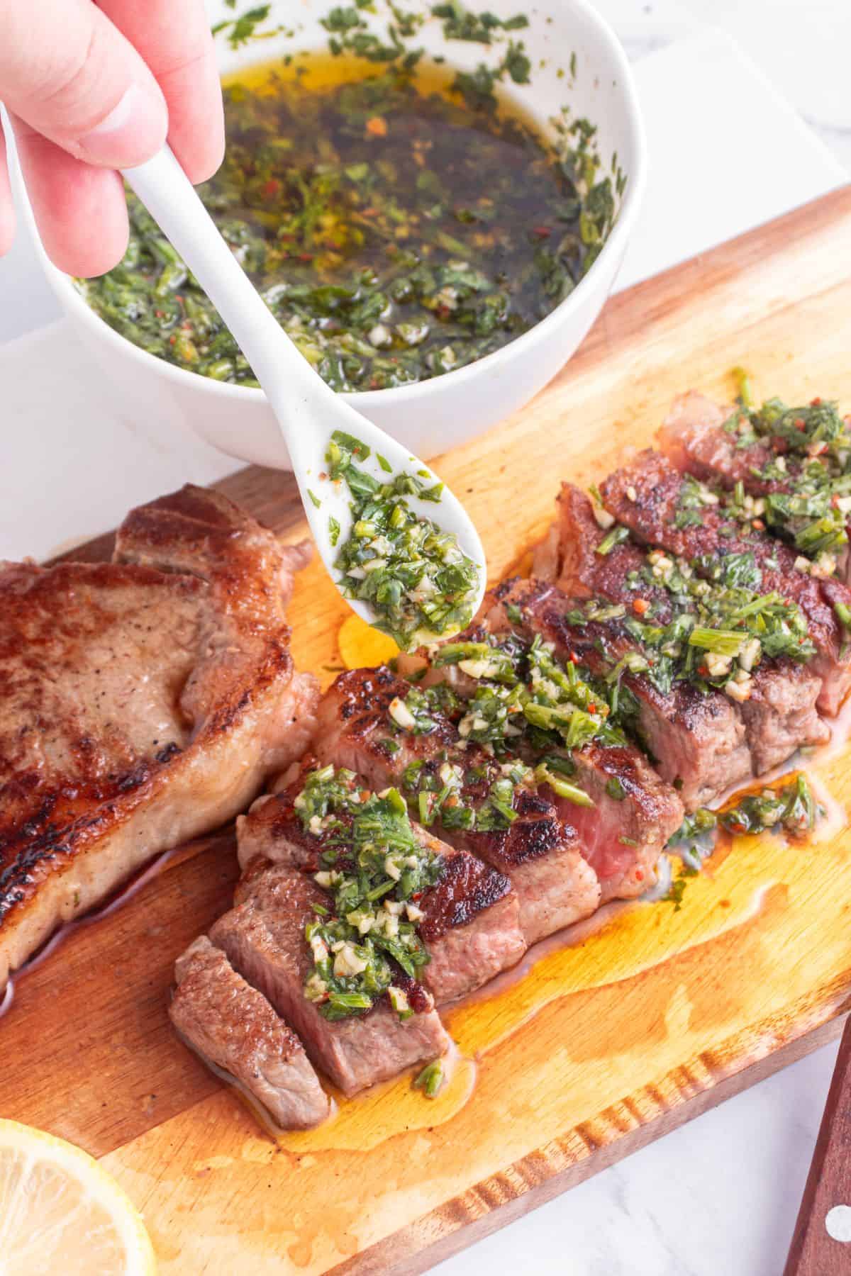 Steak with chimichurri sauce.
