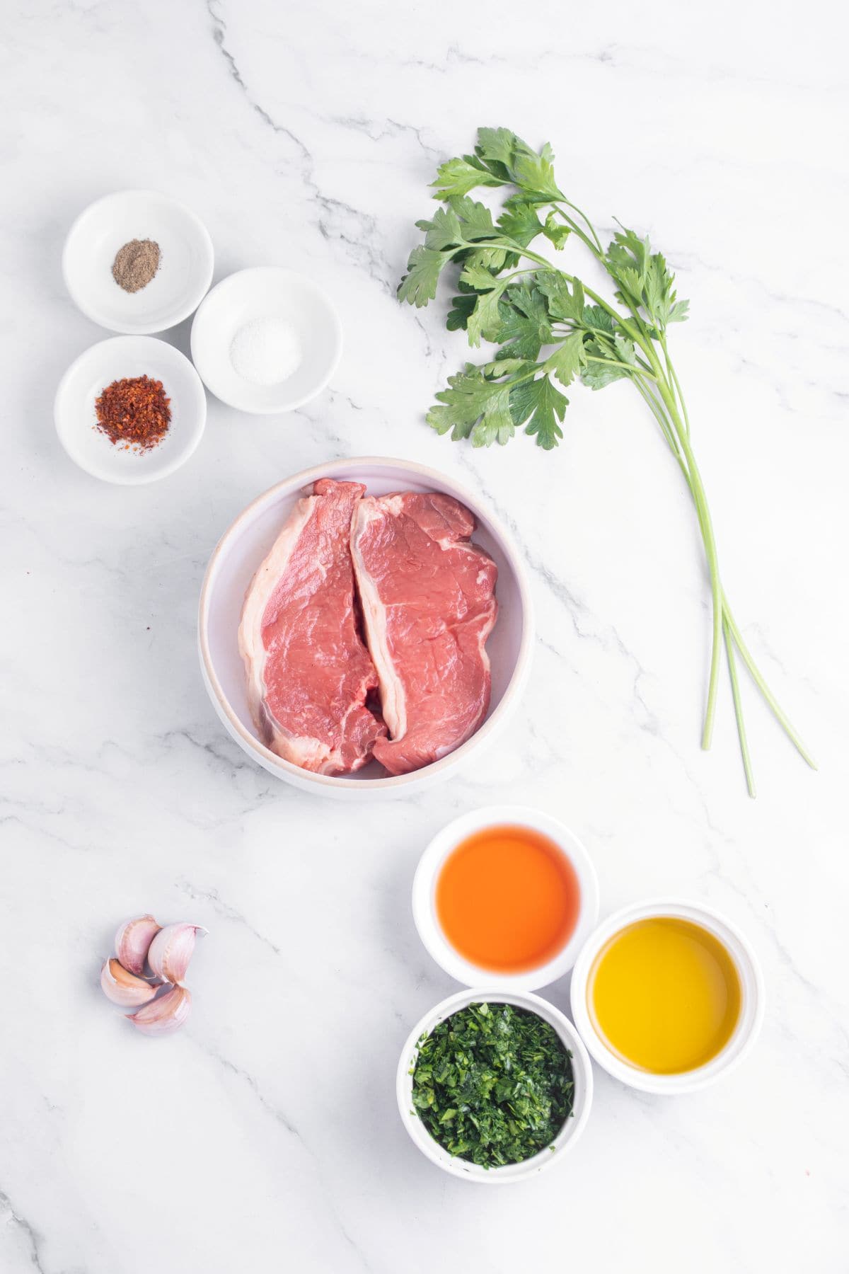 Ingredients to make chimichurri steak.
