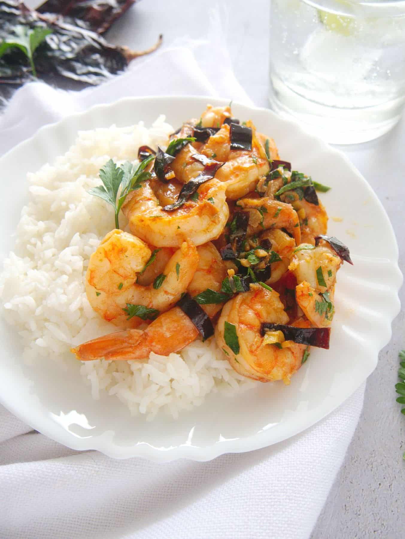 Camarones al ajillo served with steamed rice.