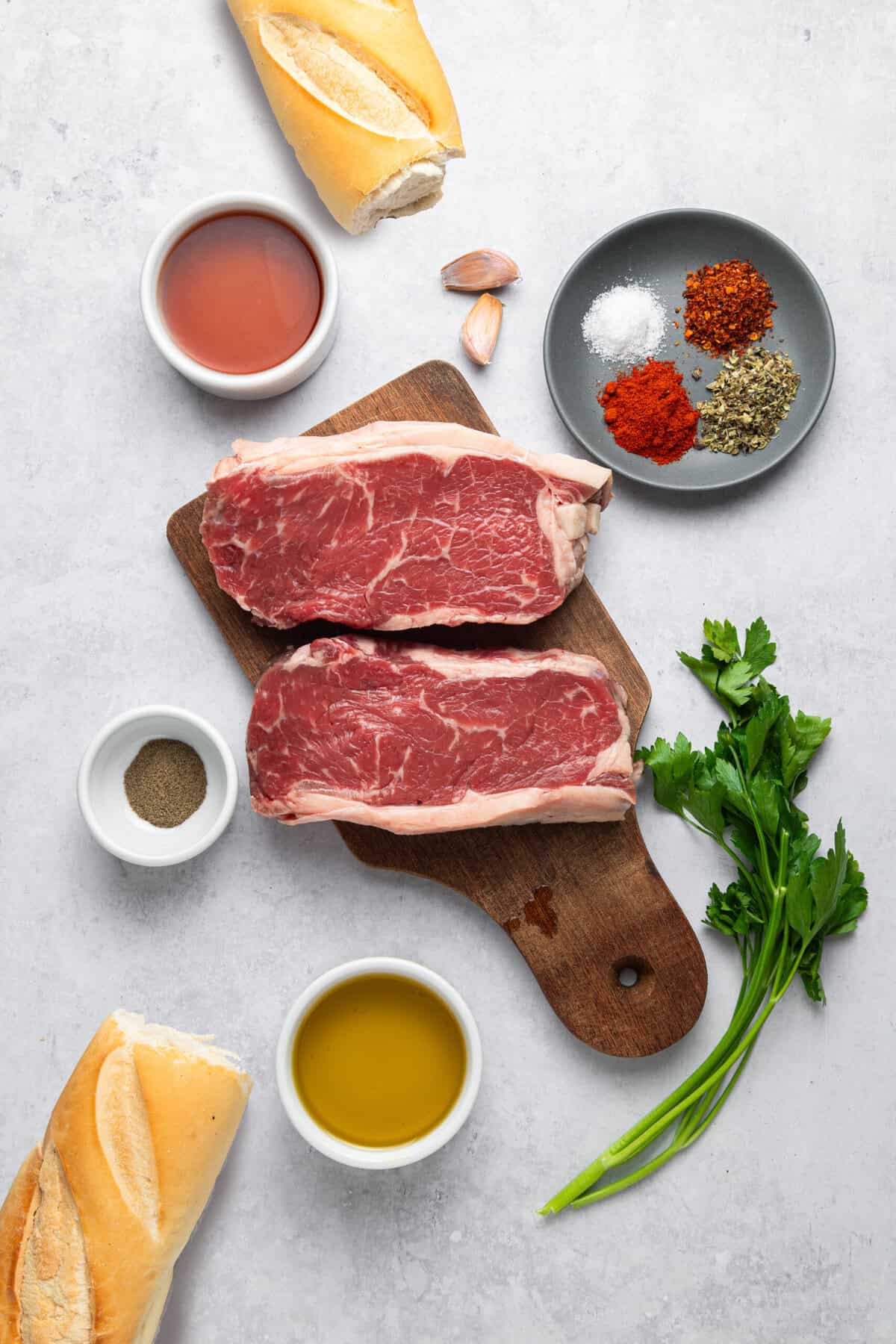 Ingredients to make chimichurri steak sandwich.
