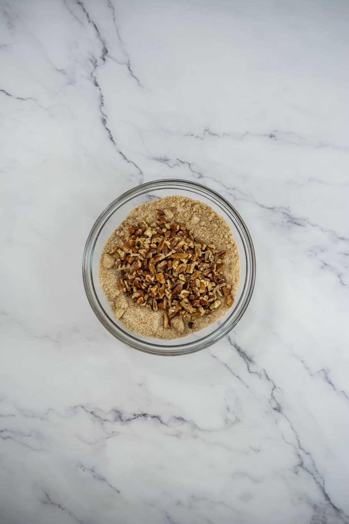 Adding chopped pecans.