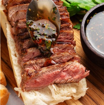 Spoon Chimichurri Sauce on Steak Sandwich
