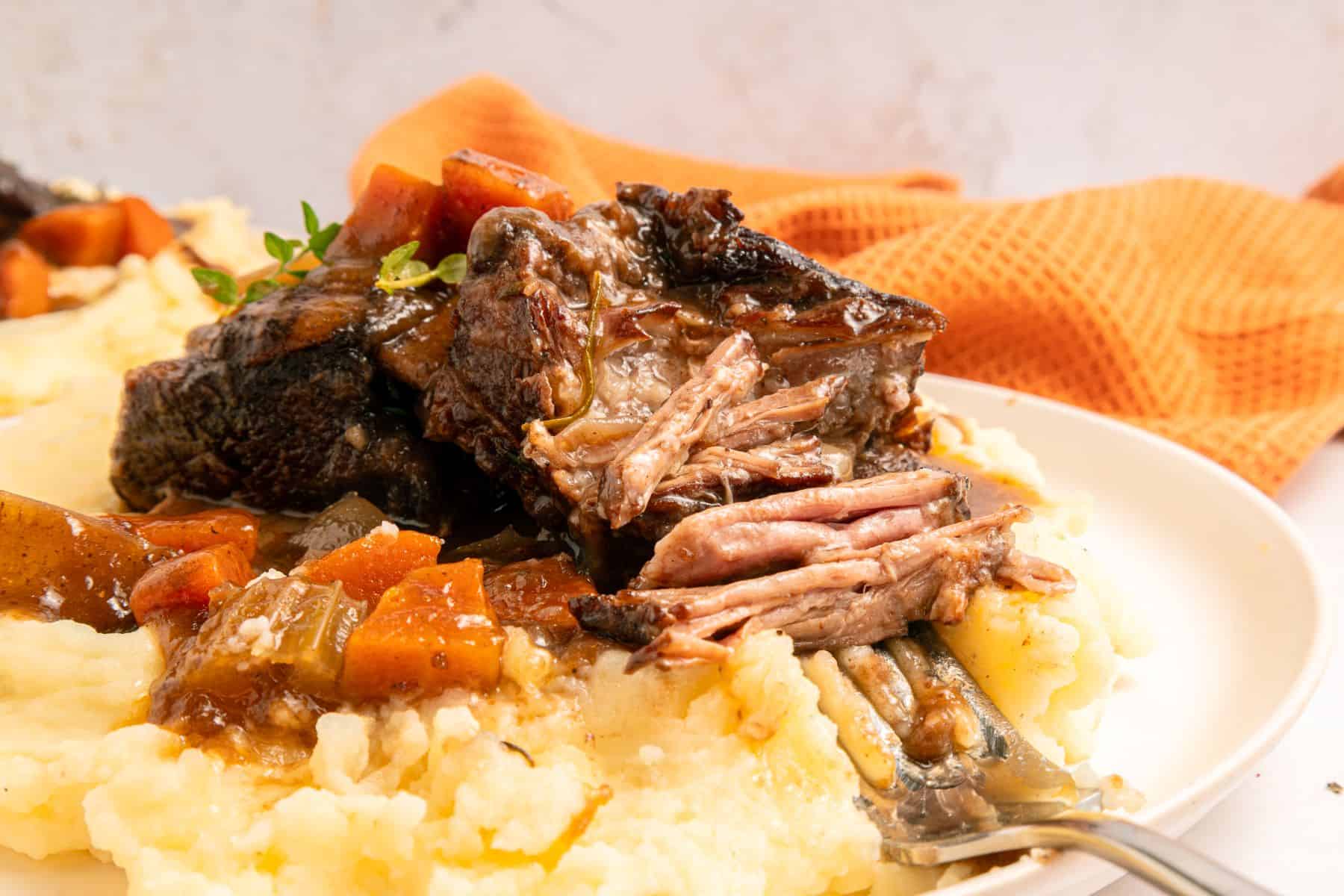Slow cooker short ribs falling off the bone.