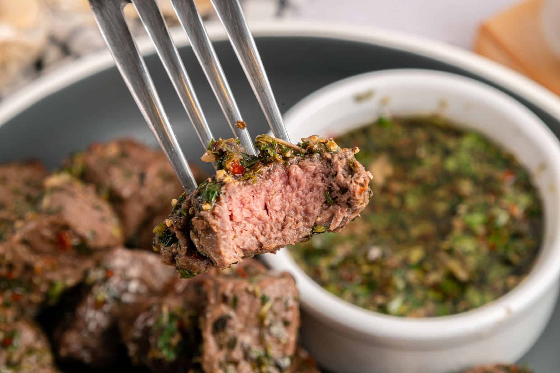 Interior of juicy and tender steak bite.