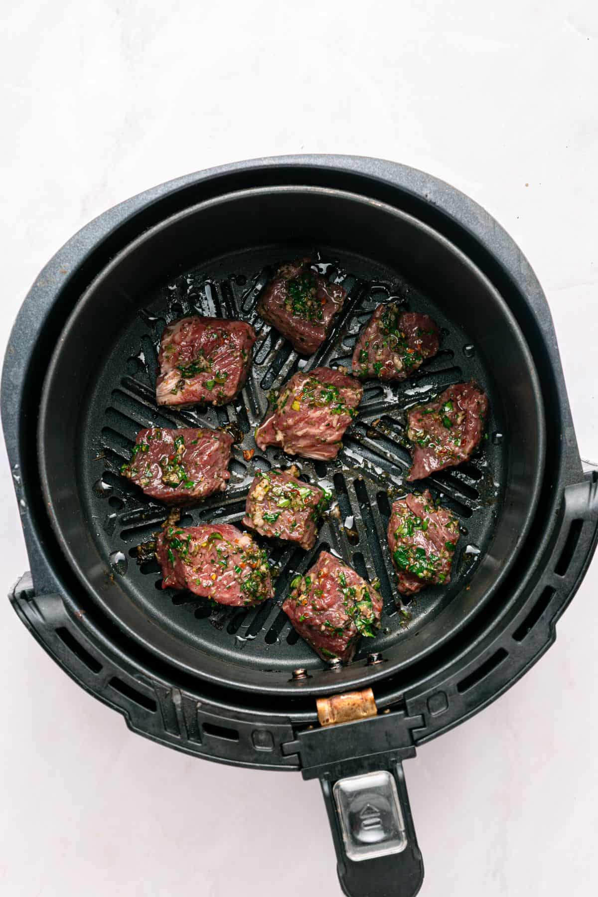 Tossing with chimichurri sauce.