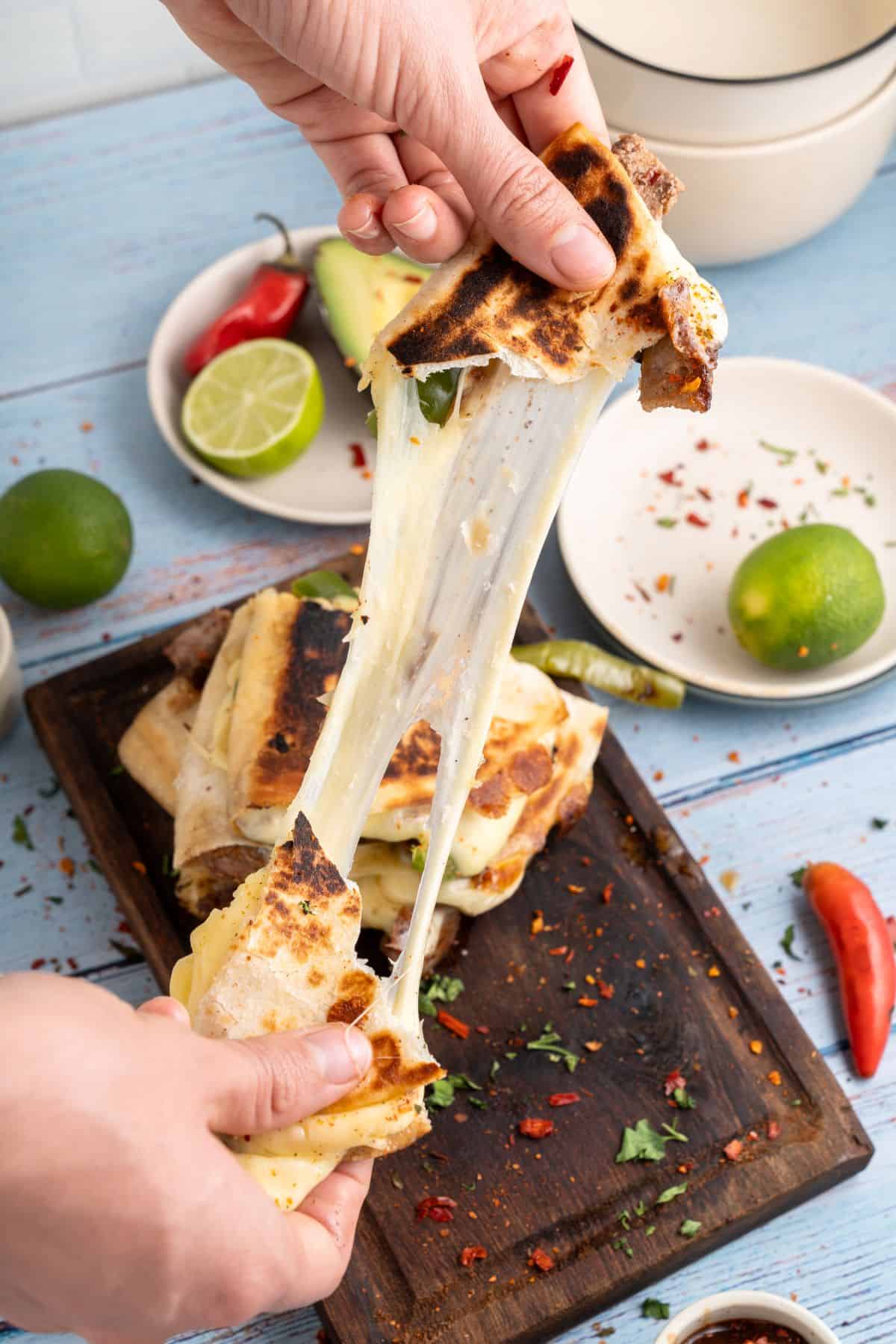 Steak quesadillas with melty cheese.