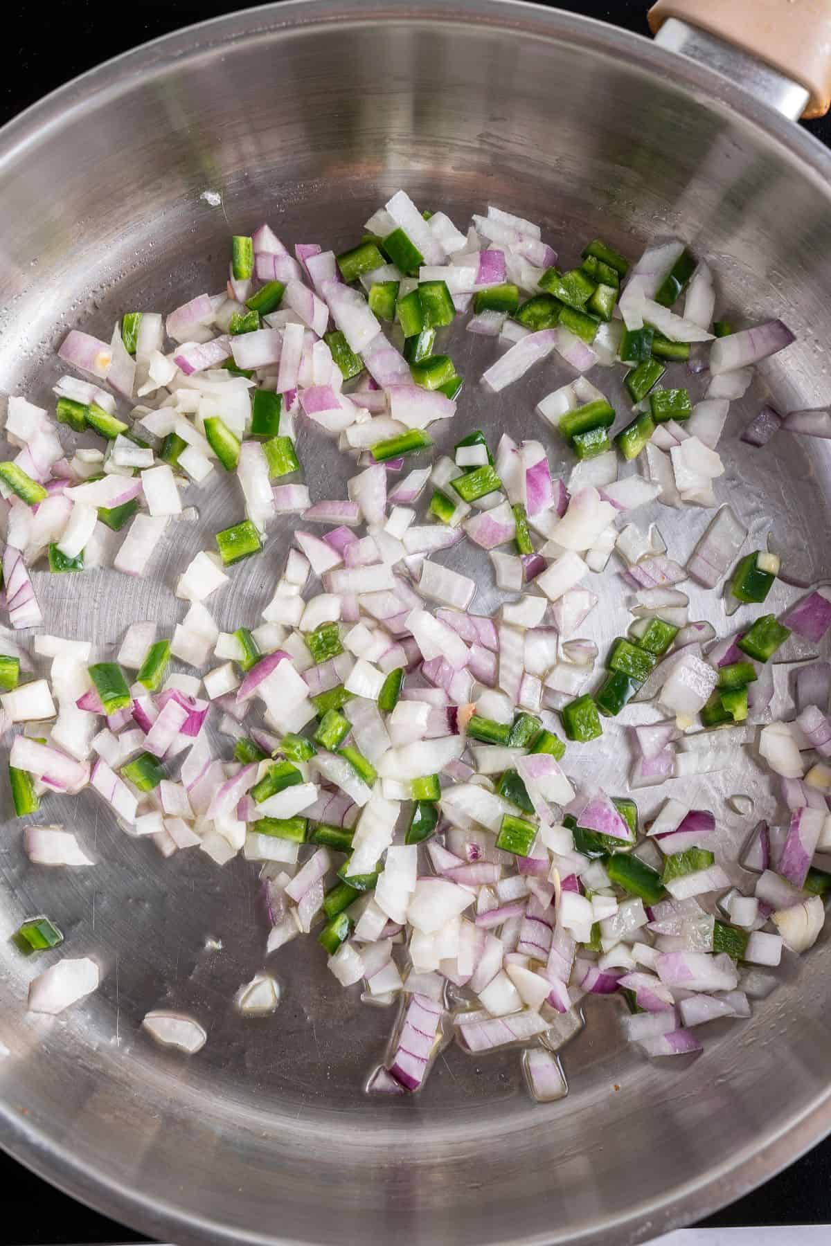 Sauteing onion and jalapenos.