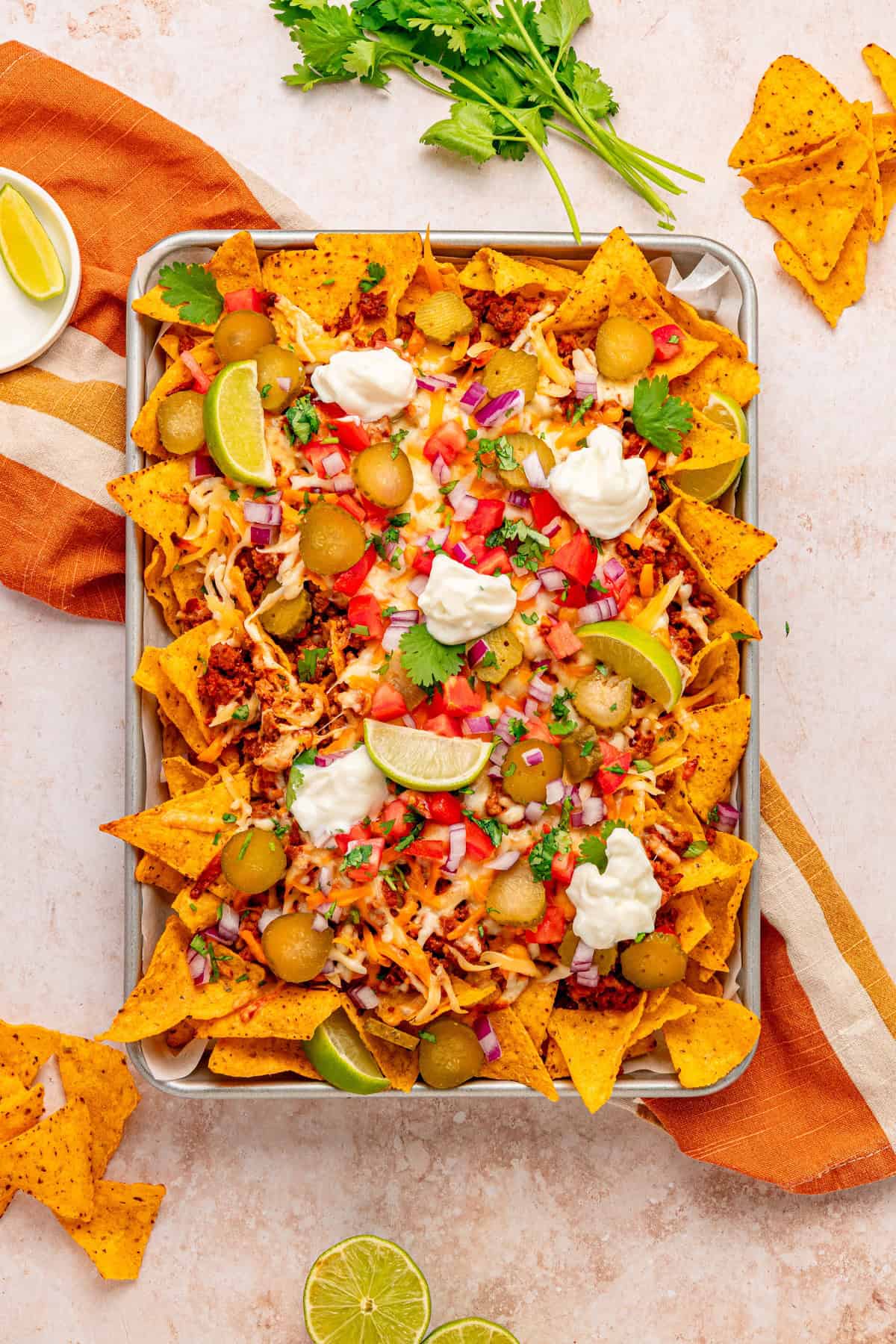 Chorizo nachos with fresh toppings.