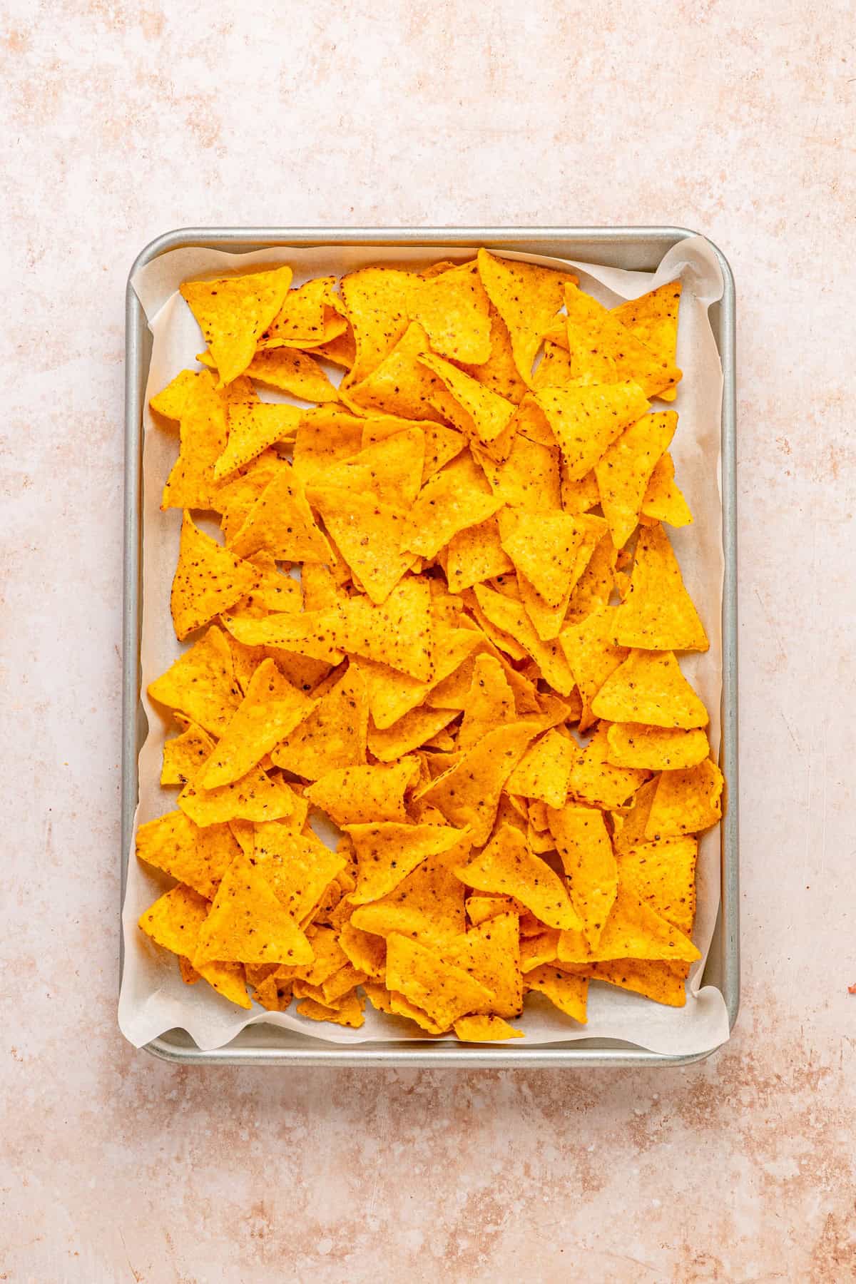 Nachos in a sheet pan.