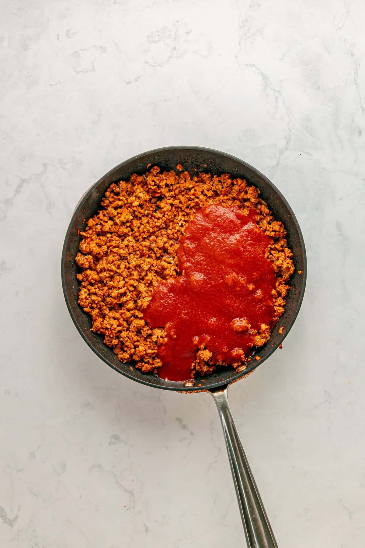 Cooked chorizo and passata.