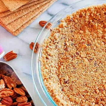 The Ultimate Graham Cracker Pie Crust with Pecans and a hint of cinnamon