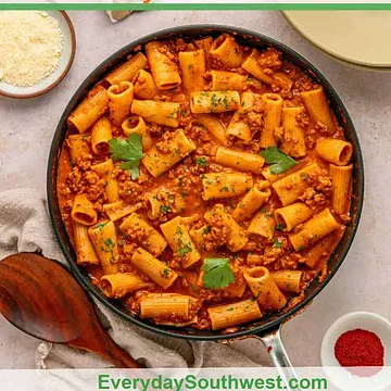 Creamy Chorizo Pasta in a skillet with spicy sauce